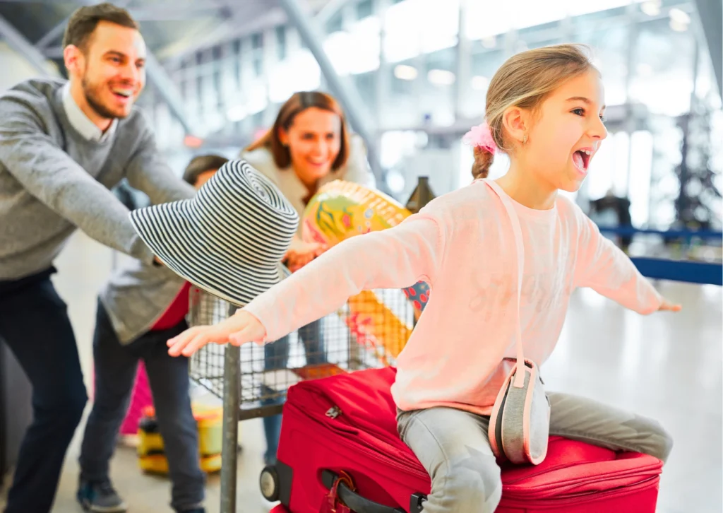 Family in their Carry-On Bag at the airport